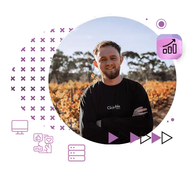 Ben Percival, owner of Clickable Web Co, standing in a Barossa Valley vineyard with purple digital design graphics around the portrait.